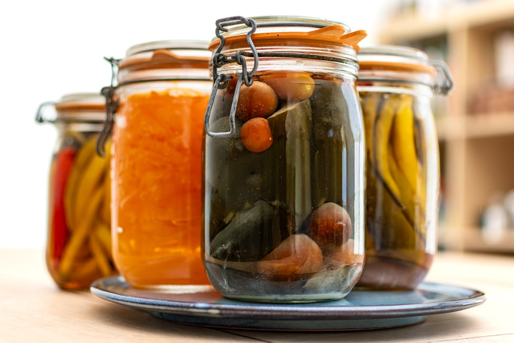 Jars of food, fruit and vegetables, sterilized or fermented